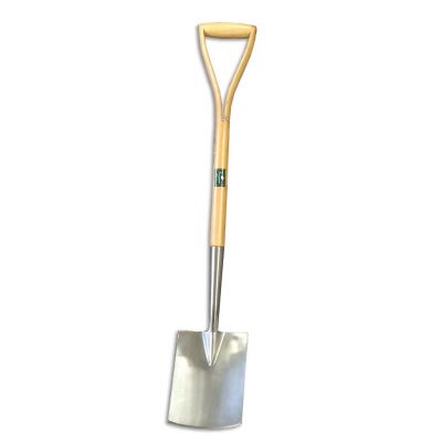 Spade with stainless steel blade and wooden handle stood vertically on a white background. It has an open YD handle