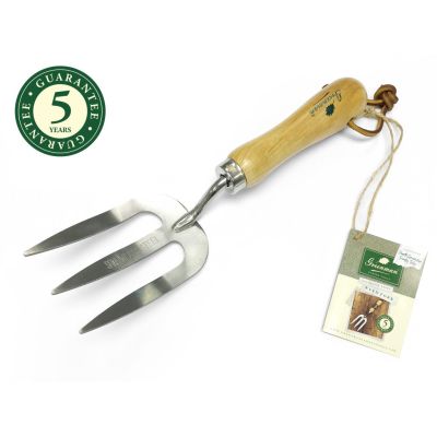 Wooden handled stainless steel hand fork stood vertically on a white background